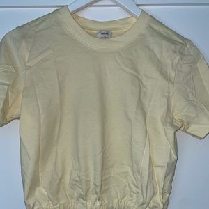 Wilfred yellow shirt